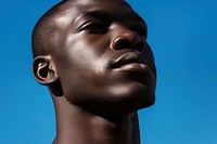 African american man outdoors blue face. AI generated Image by rawpixel.