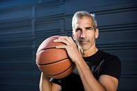 Man holding basketball sports photo gym. 