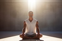 Practicing yoga sitting sports adult. 