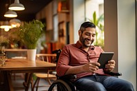 Adult wheelchair sitting smiling. 