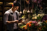 Asian man shopping flower concentration. 