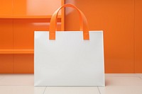 Orange shopping bag handbag white accessories. 