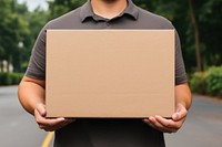 Brown paper box cardboard holding electronics. 