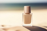 Nail polish bottle cosmetics perfume beach. 