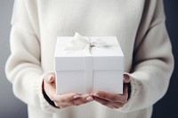 White gift box holding celebration anniversary. 