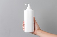 Lotion container bottle hand. 