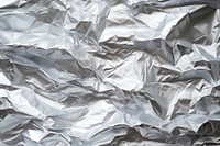 Aluminum foil backgrounds textured aluminium. AI generated Image by rawpixel.