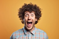 Excited curly haired man shouting portrait adult. 