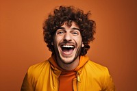 Excited curly haired man laughing shouting portrait. AI generated Image by rawpixel.