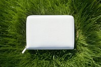 Tote bag grass wallet plant. AI generated Image by rawpixel.