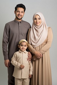 Happy Muslim family smiling adult togetherness. AI generated Image by rawpixel.