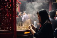 Chinese temple smoke praying incense. AI generated Image by rawpixel.