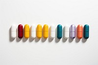 Capsule pills white background organization arrangement. 