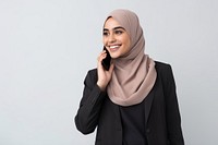 Young Muslim woman calling mobile phone smiling scarf adult. 