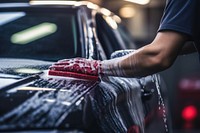 Car wash cleaning vehicle hand. 