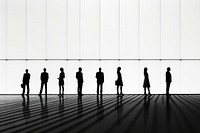 Business people silhouette walking black. 