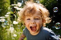 Children boy laughing portrait outdoors. 