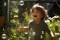 Children boy bubble laughing portrait. 