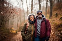 Mature african american couple walking forest adult. 