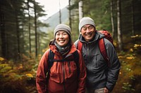 Mature asian couple forest recreation adventure. AI generated Image by rawpixel.