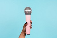 Microphone holding hand performance. AI generated Image by rawpixel.