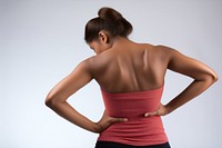 Back pain adult woman white background. 