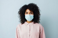 Woman wearing a facemask standing adult protection. AI generated Image by rawpixel.