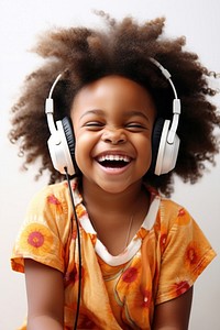 Headphones laughing headset child. AI generated Image by rawpixel.
