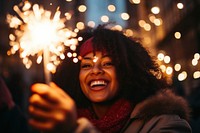 Portrait laughing sparkler sparks. 