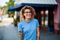 Outdoors glasses t-shirt smiling. 