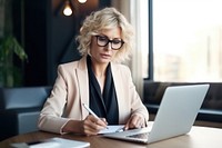 Lawyer working computer glasses writing. 