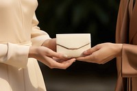 Invitation card hand accessories accessory. AI generated Image by rawpixel.