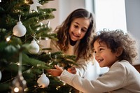 Christmas child smiling family. AI generated Image by rawpixel.