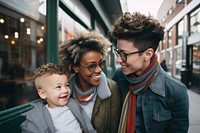 LGBTQ couple laughing glasses family. 