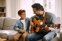 Dad teaching son play guitar musician father family. 