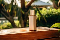 Cosmetics outdoors perfume bottle. AI generated Image by rawpixel.