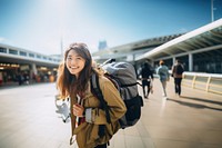 Dragging baggage tourist smiling photo. 