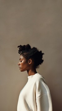 Black woman wearing white sweater portrait adult contemplation. 