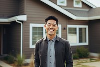 Smiling asian american man standing portrait adult. 