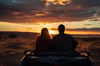 Couple watching the sunset outdoors vacation nature. AI generated Image by rawpixel.