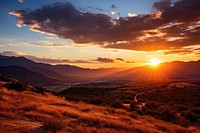 Mountains in the distance sunset landscape sunlight. 