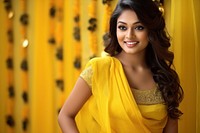 Yellow saree adult smile hairstyle. 