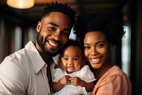 African American family baby portrait smiling. 