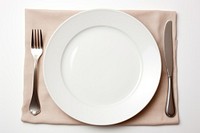 Diner place plate fork napkin. 