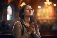 Praying adult woman contemplation