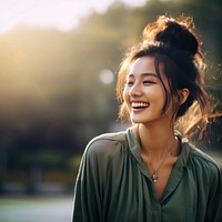 Young chinese woman laughing portrait smile. 