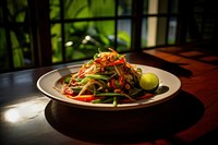 Thai papaya salad table plate plant. 