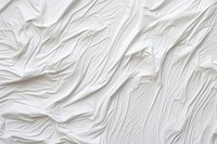 Vertical wrinkled paper white backgrounds textured. AI generated Image by rawpixel.