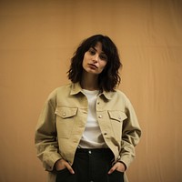 Woman wearing jacket portrait photo. 