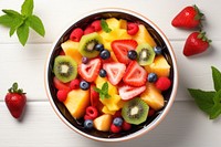 Fresh fruit salad bowl strawberry blueberry. 